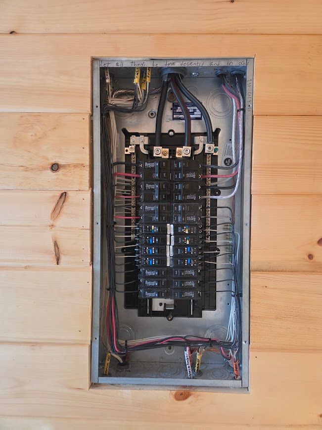 Open 200-amp panel upgrade with neatly run wiring by Volt Pro Services