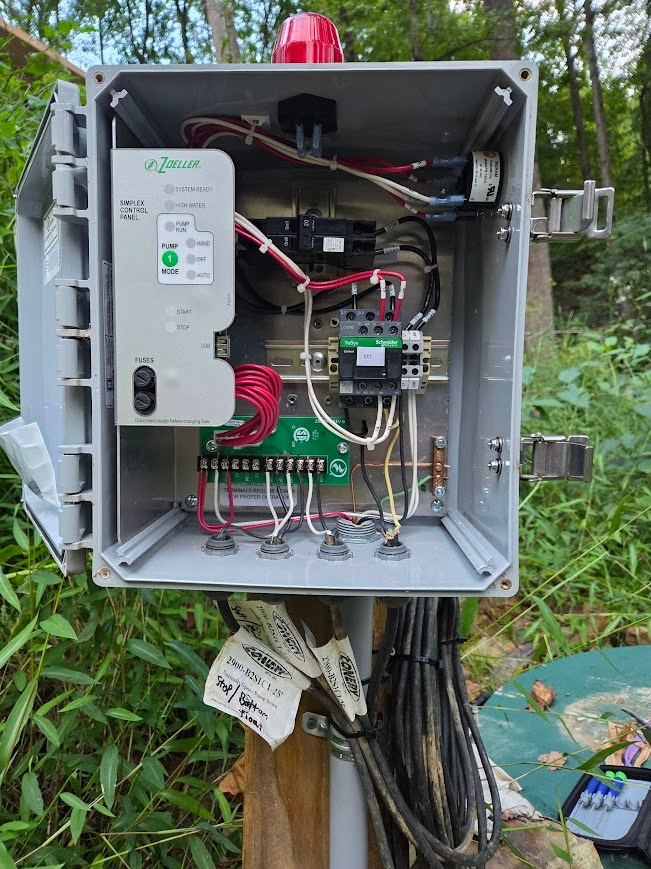 Outdoor pump control panel with red beacon